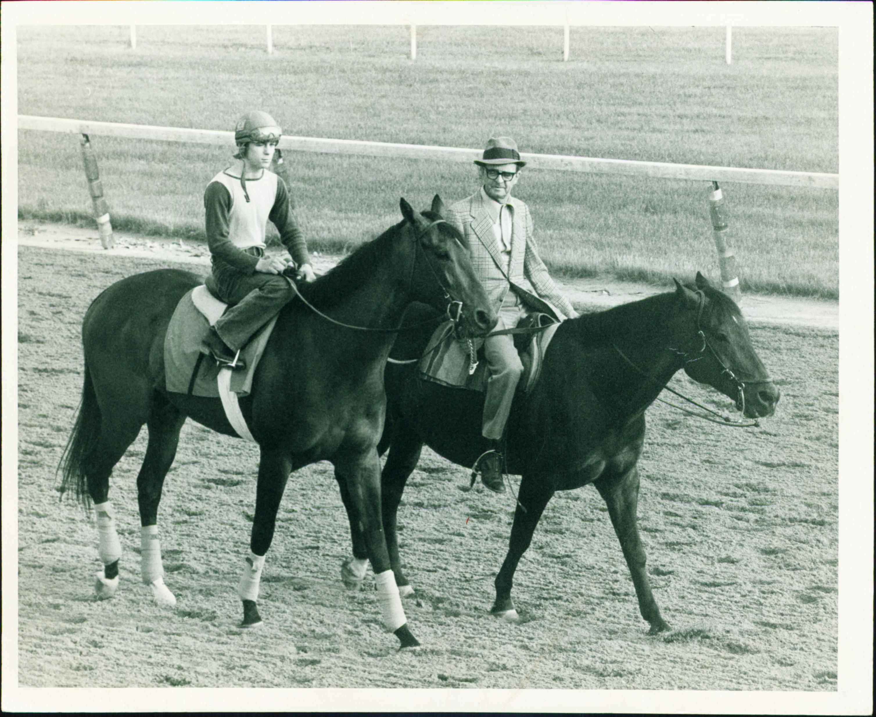 Woody Stephens, right, with his 1974 Kentucky Derby winner Cannonade.